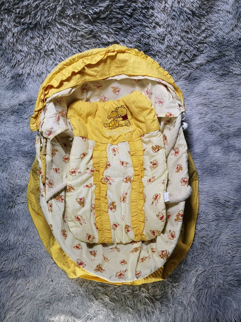 Winnie the pooh baby bassinet hotsell