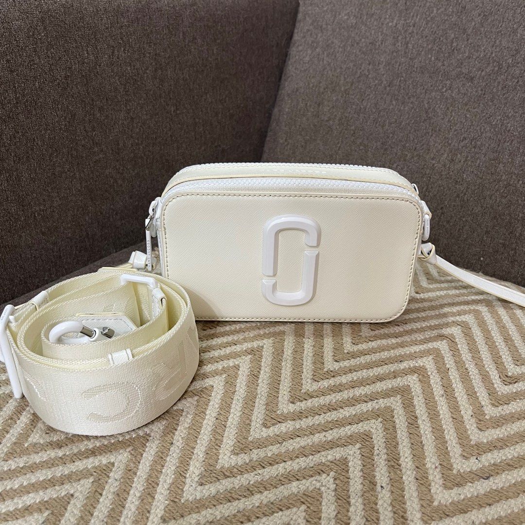 Marc Jacobs Snapshot DTM Sunkissed Sling Bag, Luxury, Bags & Wallets on  Carousell