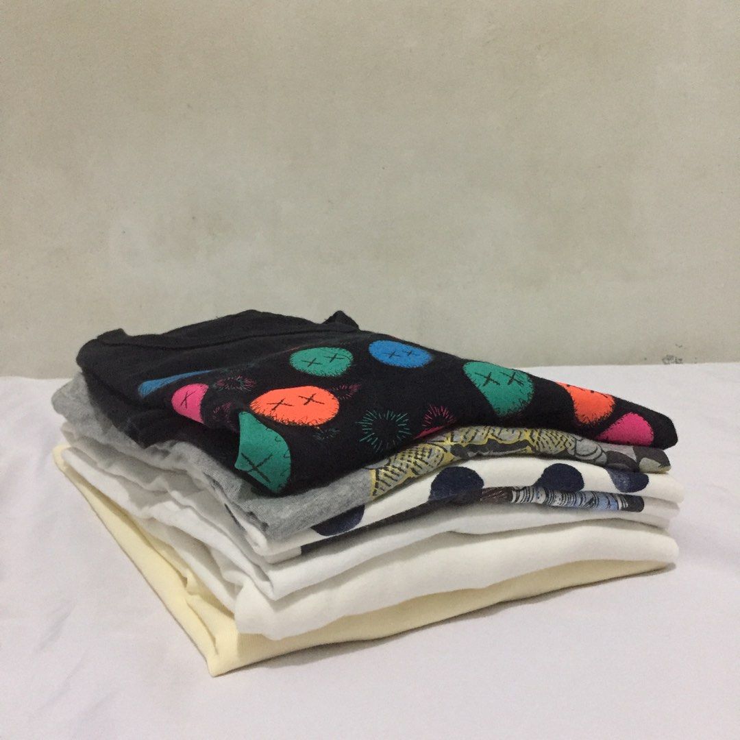Bundle #2 Uniqlo Shirts (Category: Shirts) located in Balanga. Submitted by vintagefanatics (Listing ID 1256117692, Image 2). Description: Thrifted preloved shirts! 1 Uniqlo gray 1 Original fake x Kaws black 3 Uniqlo whites Disney 2 Uniqlo long sleeves 1 freebie gray Random sizes Photos provided 📍Bataan based (Luzon) 📍MOP: BPI / GCash 📍Courier: J&T express or LBC (if COD, please pay first 50% of the item price or if COP, full payment of the it