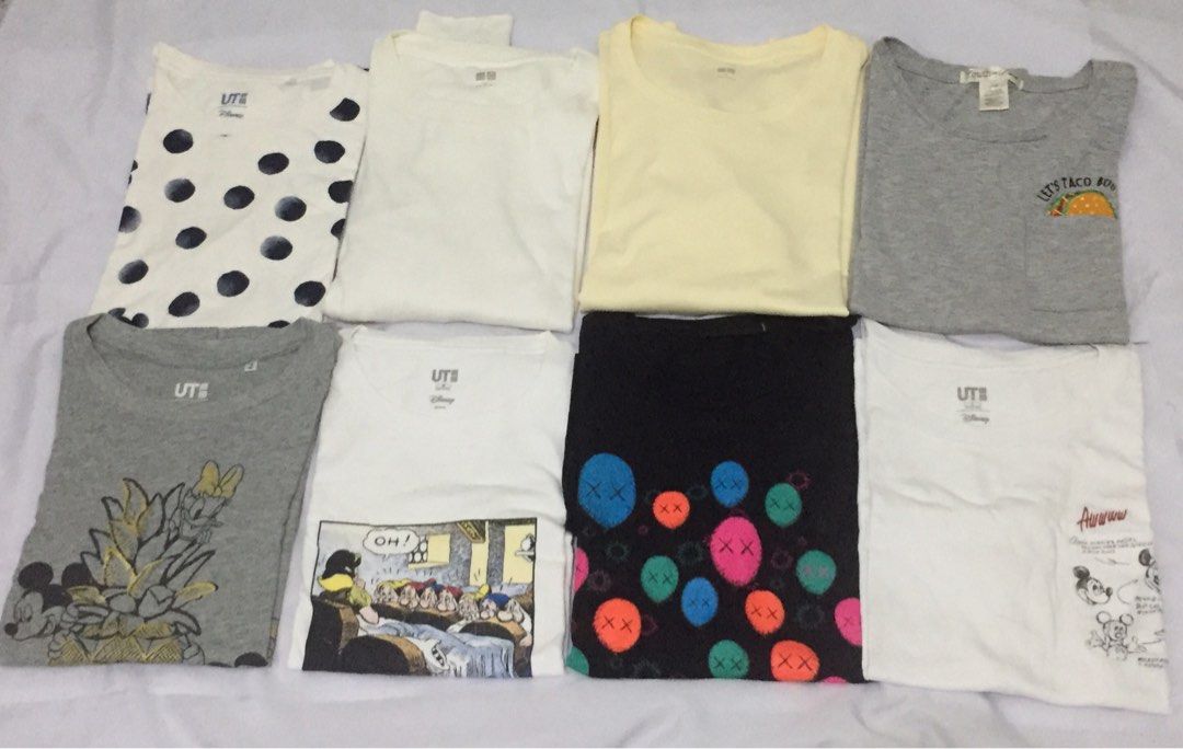 Bundle #2 Uniqlo Shirts (Category: Shirts) located in Balanga. Submitted by vintagefanatics (Listing ID 1256117692, Image 3). Description: Thrifted preloved shirts! 1 Uniqlo gray 1 Original fake x Kaws black 3 Uniqlo whites Disney 2 Uniqlo long sleeves 1 freebie gray Random sizes Photos provided 📍Bataan based (Luzon) 📍MOP: BPI / GCash 📍Courier: J&T express or LBC (if COD, please pay first 50% of the item price or if COP, full payment of the it