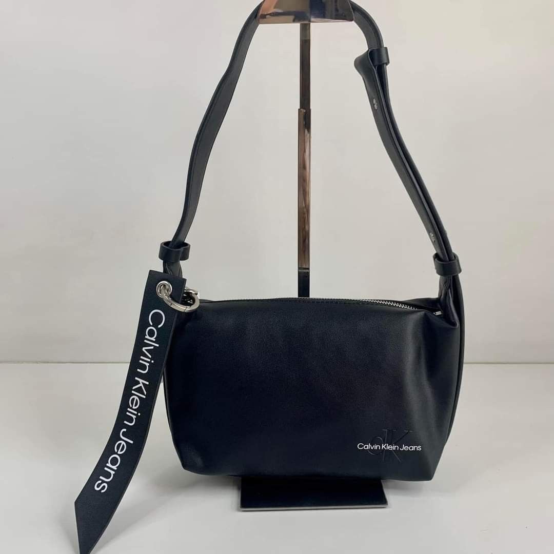 Calvin Klein Sling Bag, Women's Fashion, Bags & Wallets, Cross-body Bags on  Carousell