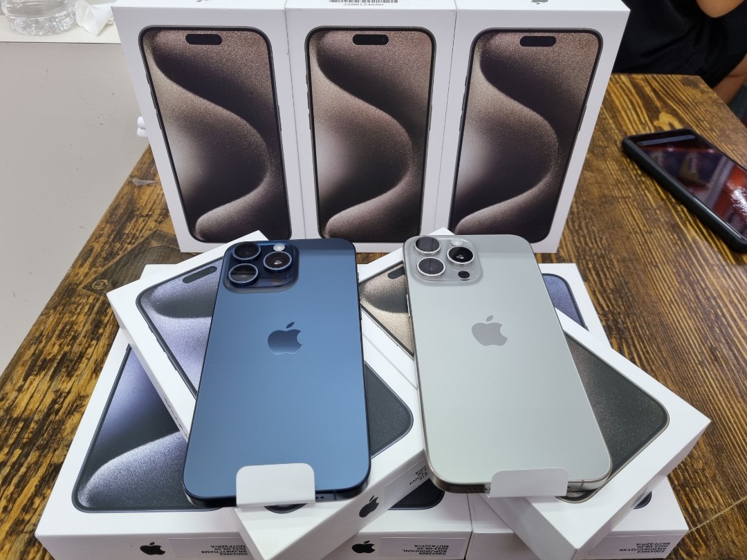 Unboxing Brand New iPhone 15 Pro Blue Titanium & iPhone 15 Pro Max in  Natural Titanium. which color do you prefer ? Video credit 🎥…