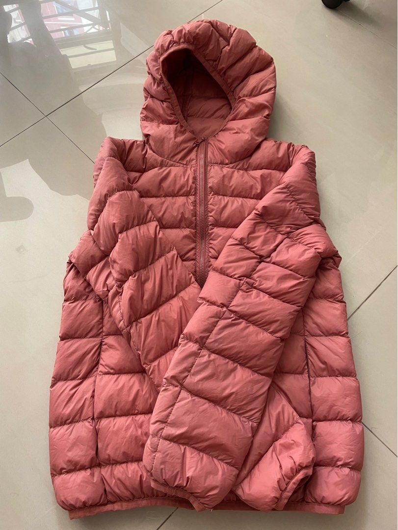 Light down jacket (Category: Babies & Kids Fashion) located in Singapore. Submitted by gc__closet (Listing ID 1256139269, Image 2). Description: Preloved Condition: 8/10 (not for fussy) Ptp: 45cm Length: 56cm Comes with a small little bag to keep the jacket Wear once only Note: 1. Stain at the front and back (refer to picture circled in green ) 2. The drawstring for the bag has some frills. (Refer to picture arrow in green) Top up $2 for normal m