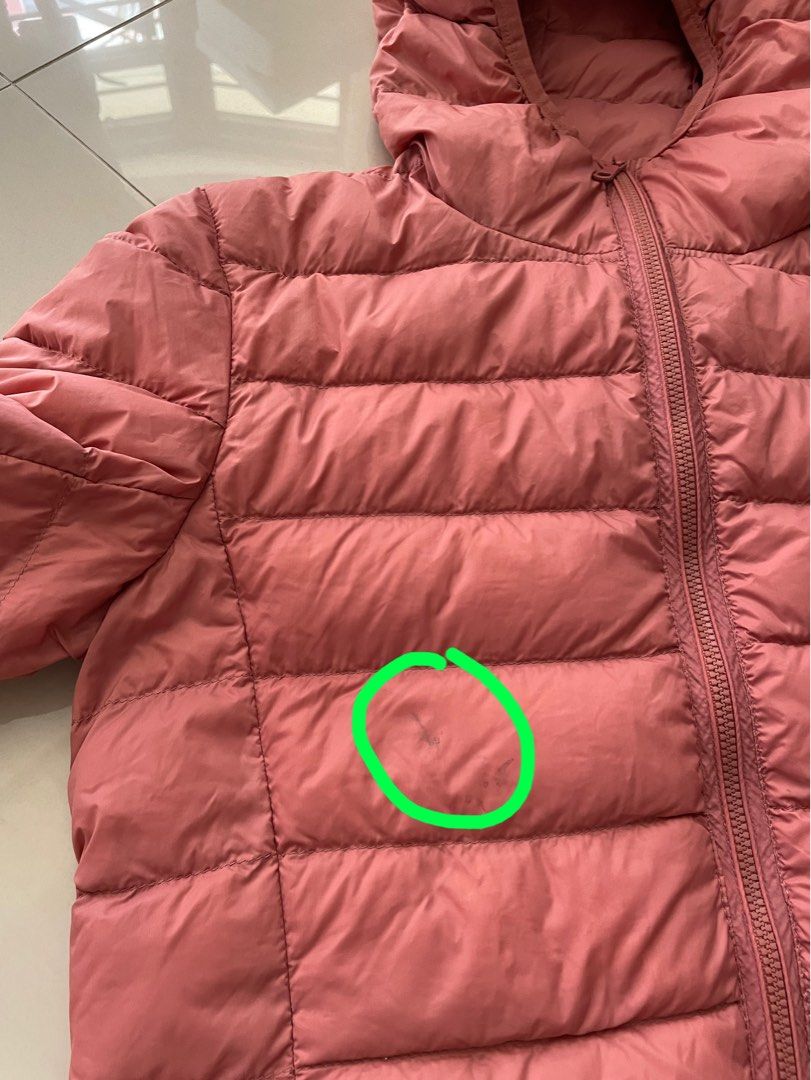 Light down jacket (Category: Babies & Kids Fashion) located in Singapore. Submitted by gc__closet (Listing ID 1256139269, Image 3). Description: Preloved Condition: 8/10 (not for fussy) Ptp: 45cm Length: 56cm Comes with a small little bag to keep the jacket Wear once only Note: 1. Stain at the front and back (refer to picture circled in green ) 2. The drawstring for the bag has some frills. (Refer to picture arrow in green) Top up $2 for normal m