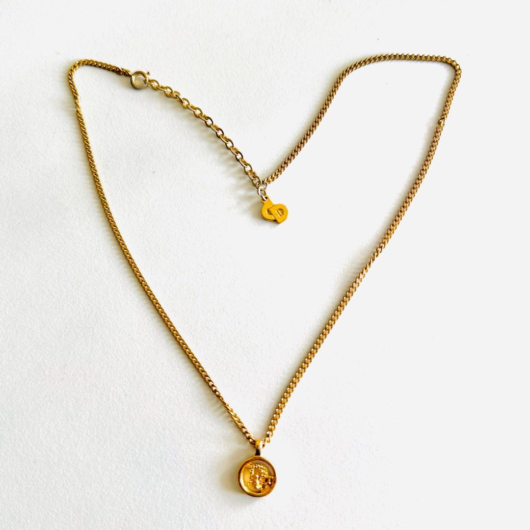 Monogram locket necklace, Luxury, Accessories on Carousell
