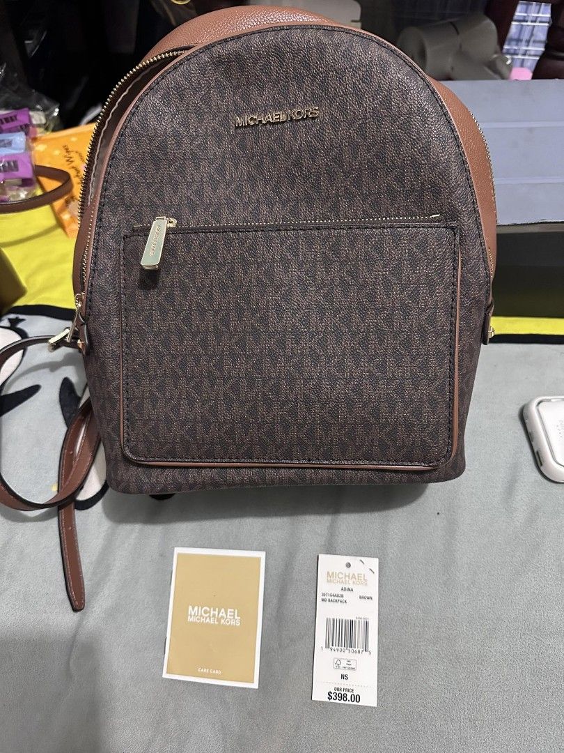 Michael Kors Adina Kenly Backpaack Pre-Loved. (Category: Luxury Bags & Wallets) located in Silang. Submitted by zrchustle.604 (Listing ID 1256168372, Image 1). Description: Pre-loved not thrifted...
