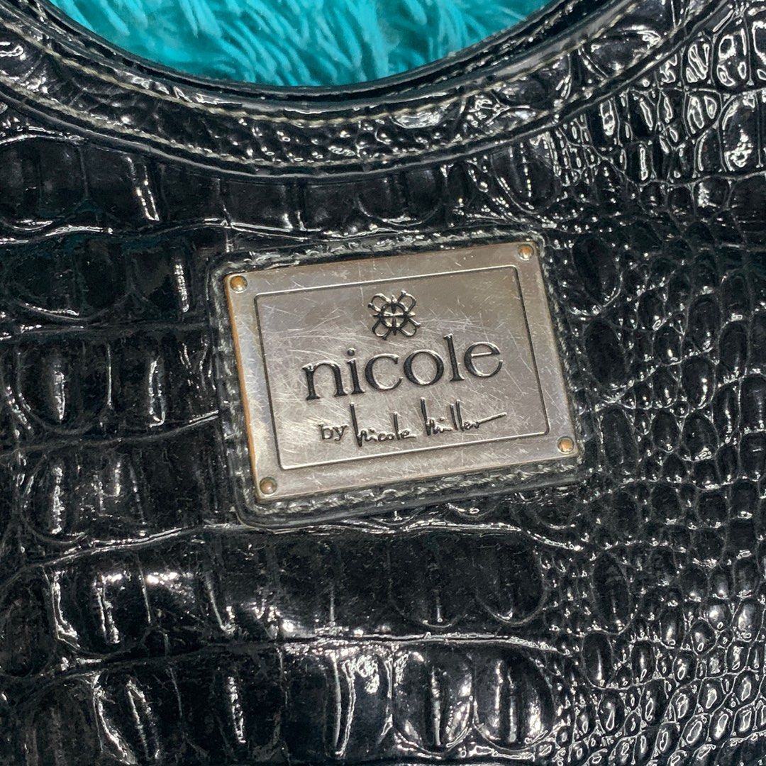 Nicole Miller Black Shoulder bag (Category: Shoulder Bags) located in Meycauayan. Submitted by SaveOnBrand (Listing ID 1256187565, Image 2). Description: Nicole Miller In Mint condition Medium size 📌LOC: Meycauayan, Bulacan 📌MOP: BANK TRANSFER(BPI, BDO, Security Bank) / Gcash / Paymaya 📌COURIER: J&T / LBC / pwede rin COD if lalamove. COP for LBC ❤️R E M I N D E R S 📌 Please manage your expectations. 📌 All items are in good condition, (flaw w
