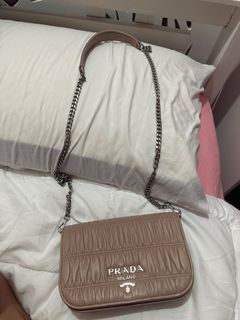 prada sling ( microchipped )