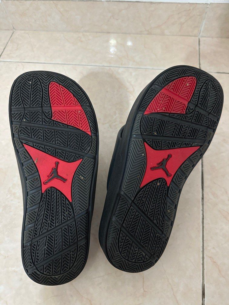Red and on sale black jordan slides
