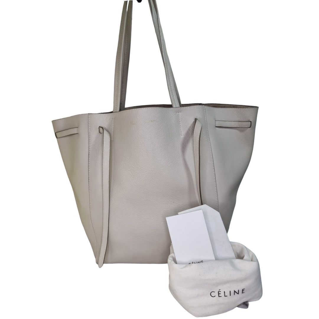 Authentic Celine Hippo Phantom Tote (Category: Luxury Bags & Wallets) located in Quezon City. Submitted by manerarestorationservices (Listing ID 1256312640, Image 1). Description: Money back Guarantee 💯% Guaranteed authentic *Brand: CELINE Hippo phnatom *Materials: Calfskin Soft leather grained *Color: cream cream *Size: Medium *Condition: 8.5/10 never been spa -Used * Inclusions: dustbag carecards Rank review by the criterion of our shop about 