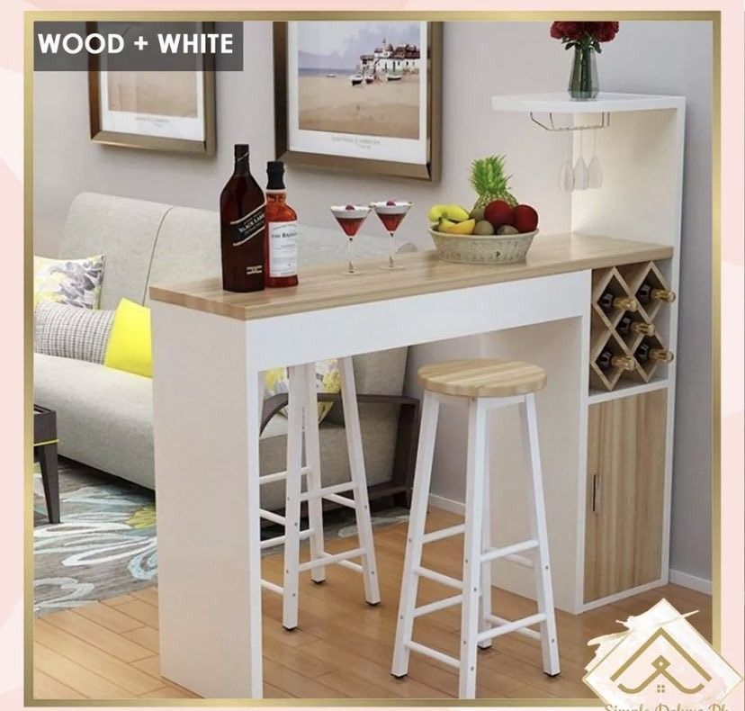 Bar table with wine storage (Category: Tables & Sets) located in Valenzuela. Submitted by mhegz.25 (Listing ID 1256418600, Image 2). Description: Wine Table Cabinet bar one home living room partition bar table simple modern porch high table SIMPLE DELUXE PH MINI WINE TABLE + 2 STOOL SET Color Option: Black White White Wood Maple White Actual Dimension L- 120cm - 47” W- 30cm - 12” H - 140cm - 140” Weight : 39.5kg Style: Simple and Modern Main mate