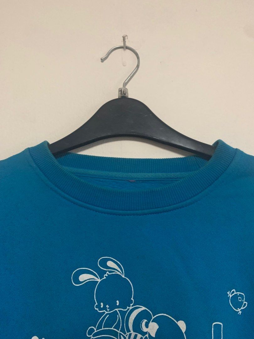 Blue Retro Graphic Sweater (Category: Longsleeves) located in Quezon City. Submitted by secondhandsiz (Listing ID 1256323134, Image 3). Description: Thrifted HQ sweater. Some minor discoloration (see photos) Fits S-M (XS-S for oversized fit).