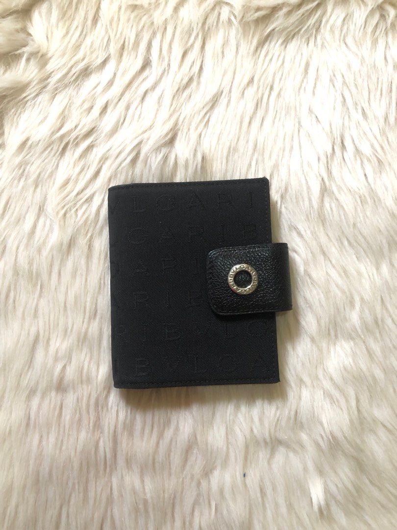 BVLGARI CARD HOLDER WALLET (Category: Luxury Bags & Wallets) located in Naga. Submitted by shieshop (Listing ID 1256335522, Image 1). Description: Original Bvlgari cardholder waller from Japan With slight tear (3 stitches) barely noticeable Canvas and leather material Preloved.