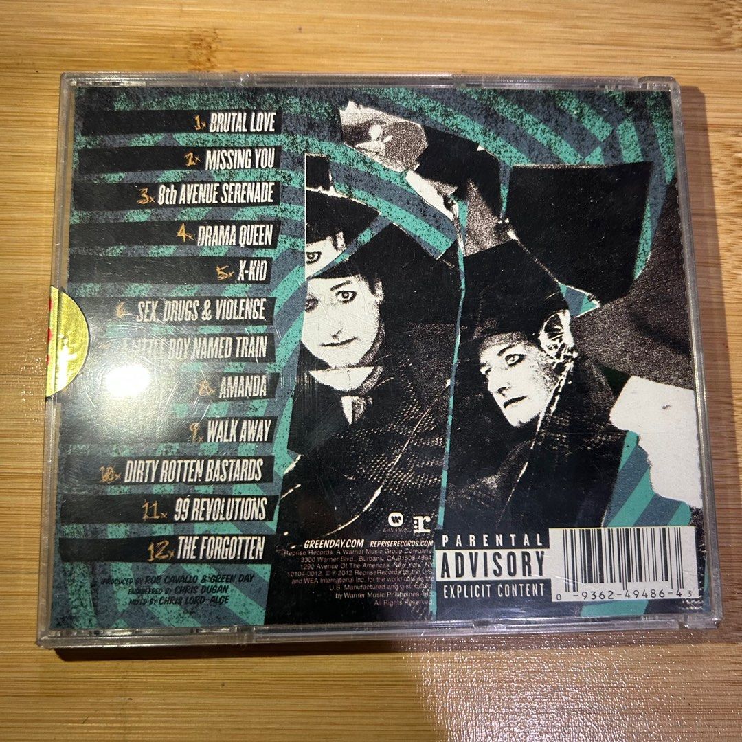 Green Day Tre CD Album (Category: CDs & DVDs) located in Quezon City. Submitted by dangogow (Listing ID 1256382428, Image 3). Description: Rare CDs nowadays, selling the same price I got it There may be flaws like cracks & dents but CD is still sealed & unused.