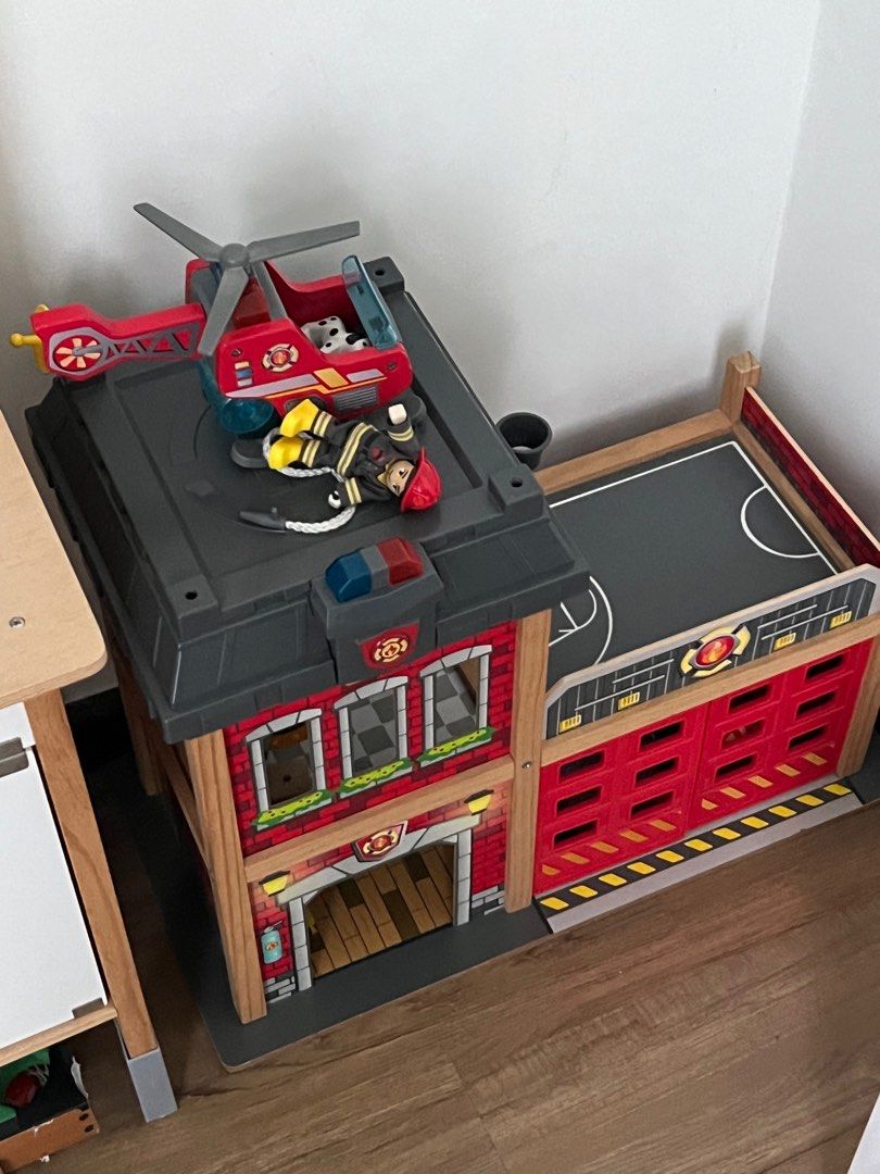 Hape fire station toy Hobbies Toys Toys Games on Carousell