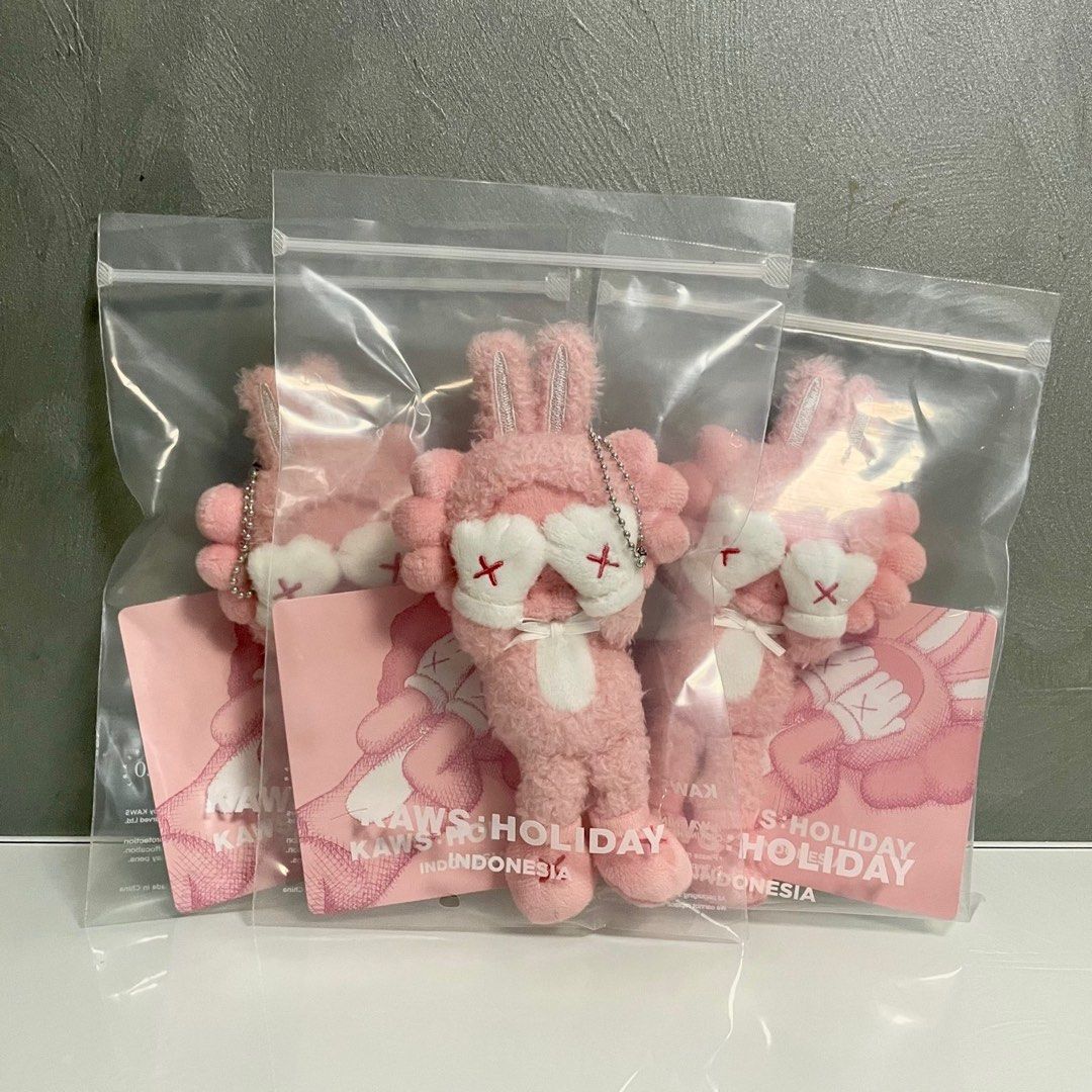 KAWS Holiday Indonesia Plush Charm pink-