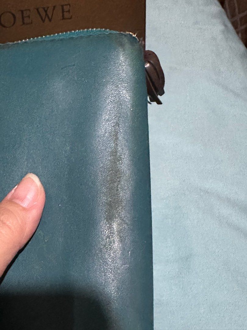loewe wallet (Category: Luxury Bags & Wallets) located in Antipolo. Submitted by ambercs (Listing ID 1256303612, Image 2). Description: auth loewe wallet with box preloved with signs of usage minor rubs ( as seen s pics) s exterior pa spa/ cleaning lang interior: in good condition zippers are working no open pipings .