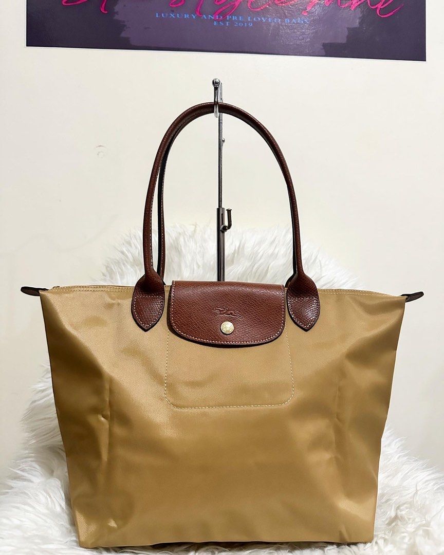 Longchamp large long handle authentic desserts beige (Category: Luxury Bags & Wallets) located in Cabuyao City. Submitted by luxbymishy (Listing ID 1256451791, Image 2). Description: Brand new complete inclusions .