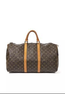 Louis Vuitton Keepall Bandouliere 55 brass hardware, cleaned with Brasso