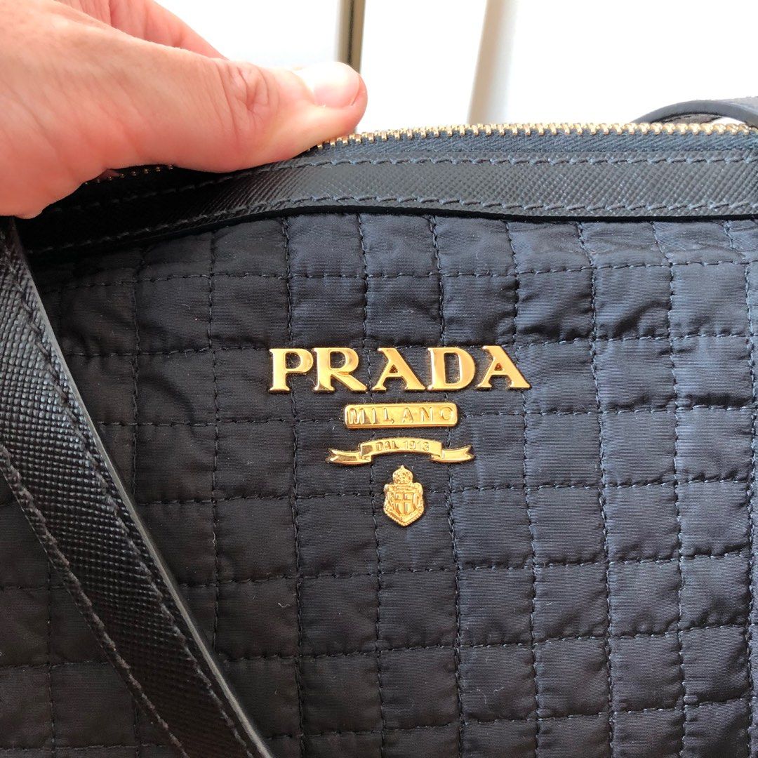Prada logo quilted shoulder bag on sale