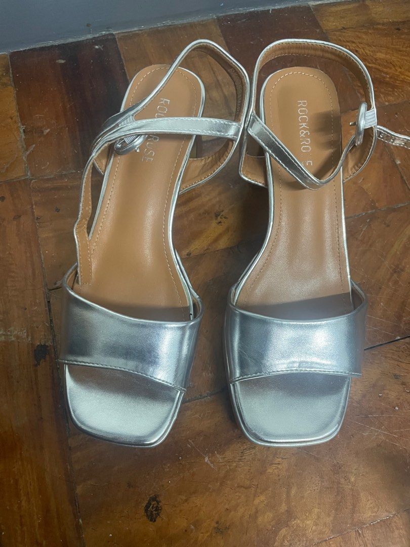 Silver Wedding Shoes size 9 (Category: Heels) located in Manila. Submitted by chesses (Listing ID 1256346459, Image 2). Description: Hi! Selling my wedding shoes/sandals Ang ganda and comfy! Rfs: served its purpose. Brand: Rock & Rose Bought for 1,699.75 last May 2023 Sf c/o buyer.