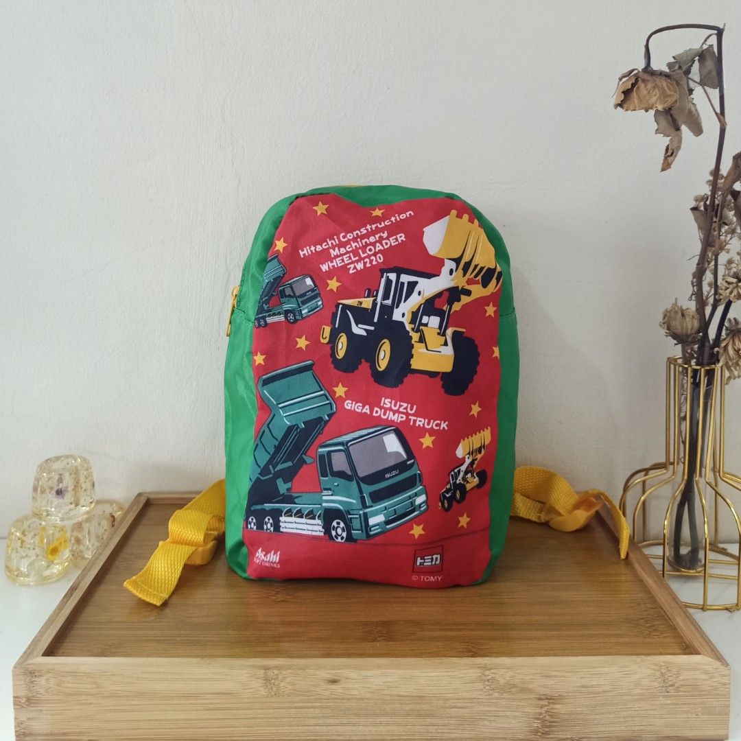 Tomica x Asahi Toddler's Backpack (Category: Babies & Kids Fashion) located in Manila. Submitted by apolloshop (Listing ID 1256459245, Image 1). Description: Tomica x Asahi Toddler's Backpack •this backpack is not padded •perfect for your little ones (ages 1 to 5 years old) •country of origin: japan •dimension: 7" x 4.5" x 9" P125 note: wala pong pad ang backpack na ito ☺️.
