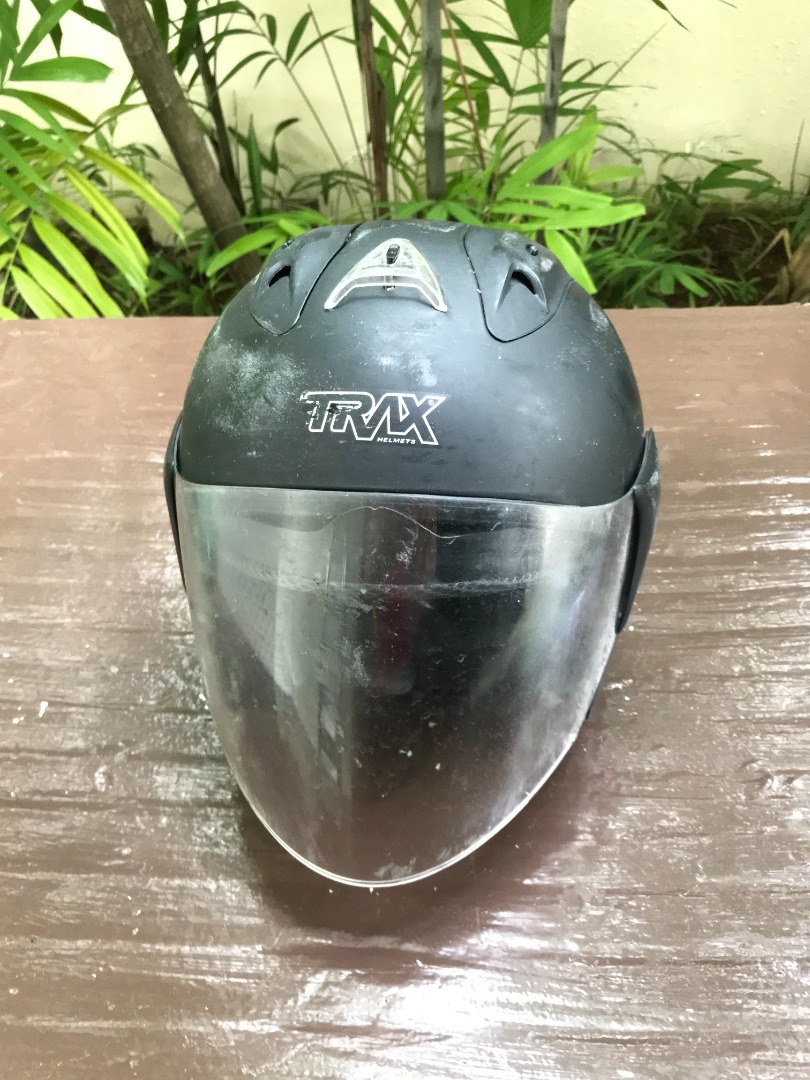 Trax motorcycle helmet Size is medium. In good condition. Has some