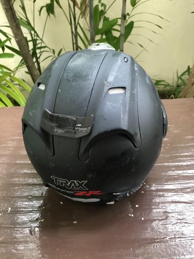 Trax motorcycle helmet Size is medium. In good condition. Has some scratches on the visor