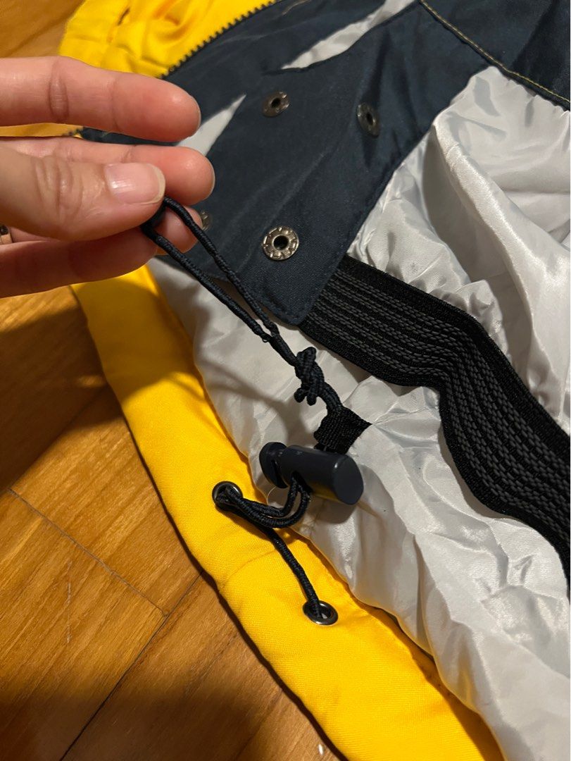 Winter jacket with yellow strap 2025