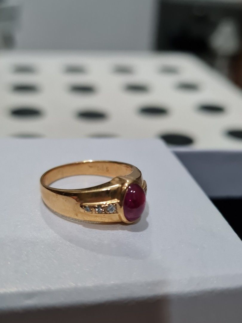 Red stone discount diamond ring