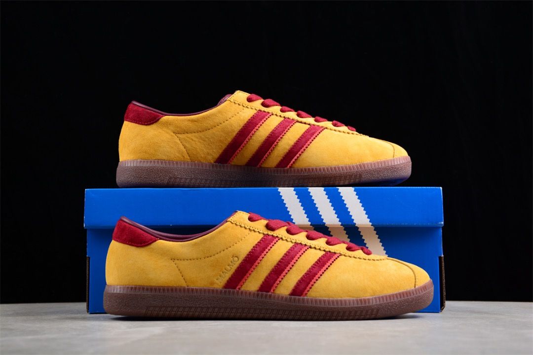 Red and hotsell yellow adidas trainers
