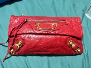 Authentic Balenciaga Sling bag. Can be used as a clutch without sling too. Comes with dust bag as seen in pix