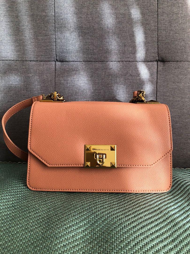Metal push discount lock crossbody bag