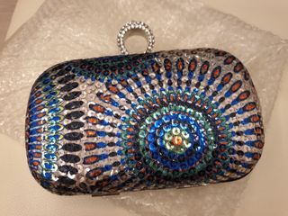 Clutch bag with strap