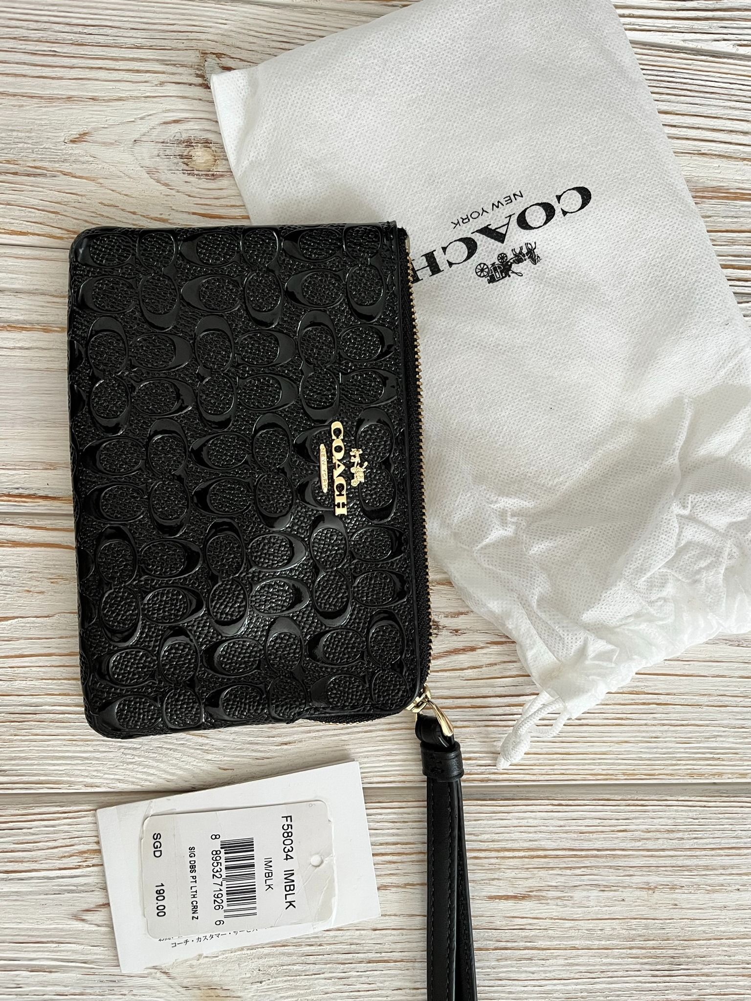 Coach Corner Zip Wristlet In Signature Leather Black