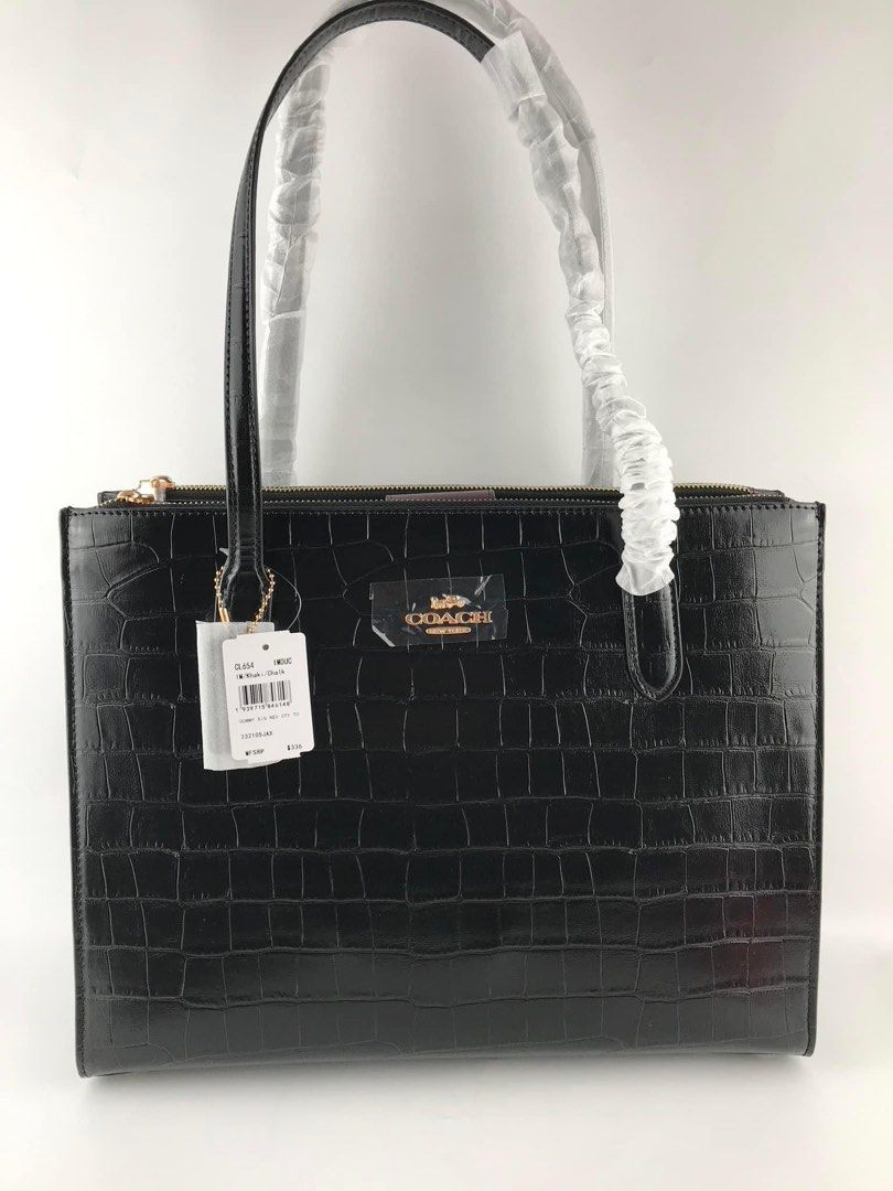 Coach Nina Caryall (Category: Luxury Bags & Wallets) located in Pasig City. Submitted by mgmanila (Listing ID 1256607621, Image 1). Description: Coach Nina Carryall Dimensions;36*28*8cm 3,000 ✔️Cash on Pickup (COP) via LBC available ✔️Cash on Delivery (COD) available ✔️MOP: Gcash,Maya And Bank transfer ✔️Shipping via Lalamove, Grab and Joyride ✔️Yes to Same day delivery🥰 📩DM us for more info or any inquiries📩 DISCLAIMER: MG MNL is not associat