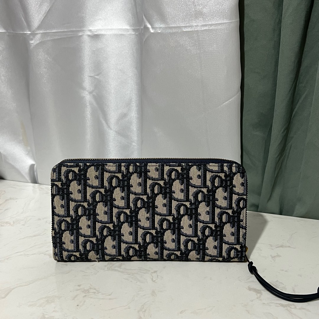 Dior Oblique passport holder, Luxury, Bags & Wallets on Carousell