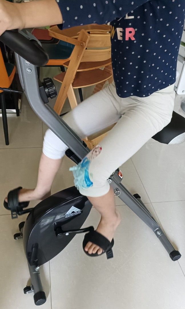 Stationary bike best sale that folds up