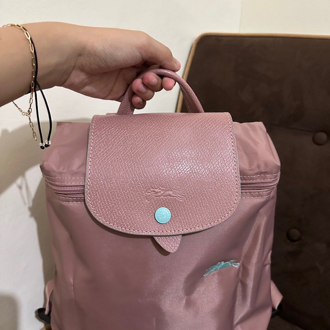 Longchamp le plige backpack (Category: Luxury Bags & Wallets) located in Taguig. Submitted by lux.mariah (Listing ID 1256589233, Image 3). Description: Guaranteed authentic Brand new Complete inclusions Courier: Lalamove / J&T foldable bag can fit laptop/ipad.