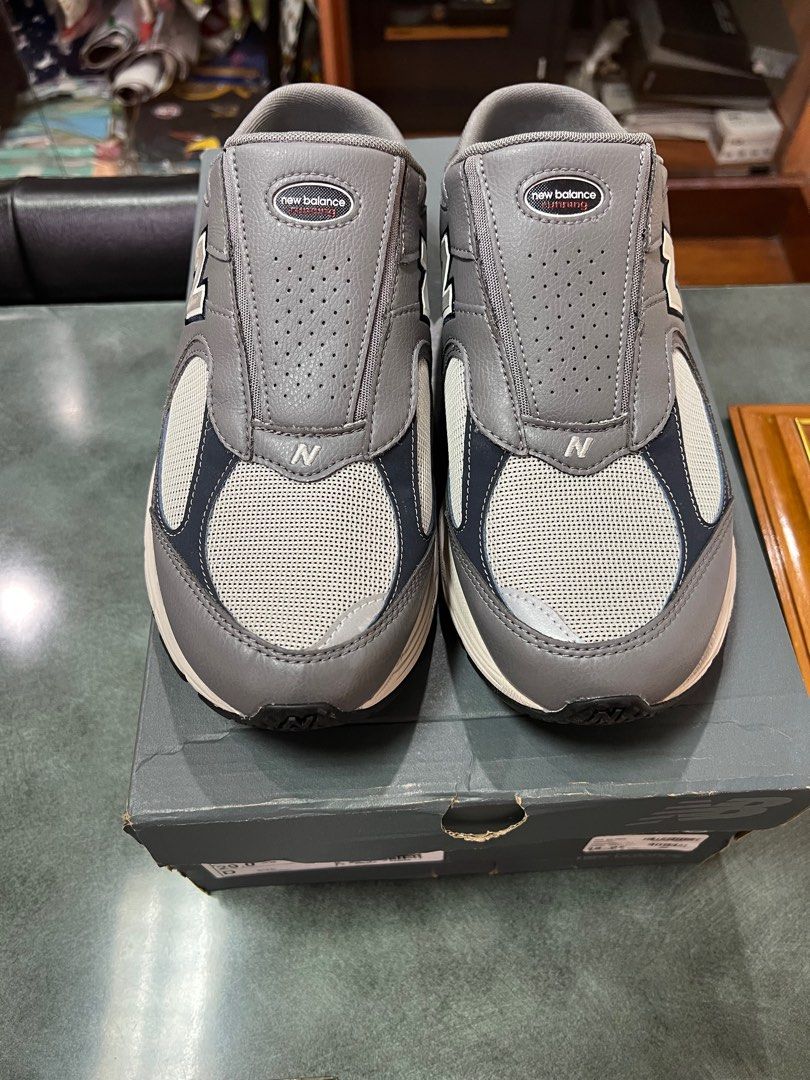 NEW BALANCE 2002R slip on shoes. Size 11 on tag. Fits a size 11.5 to 12. Brand new and authentic
