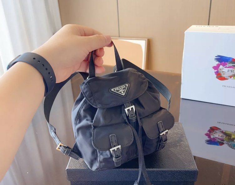 Prada nylon mini bucket bag backpack preorder (Category: Luxury Bags & Wallets) located in Angeles City. Submitted by lux.finds (Listing ID 1256650469, Image 1). Description: .