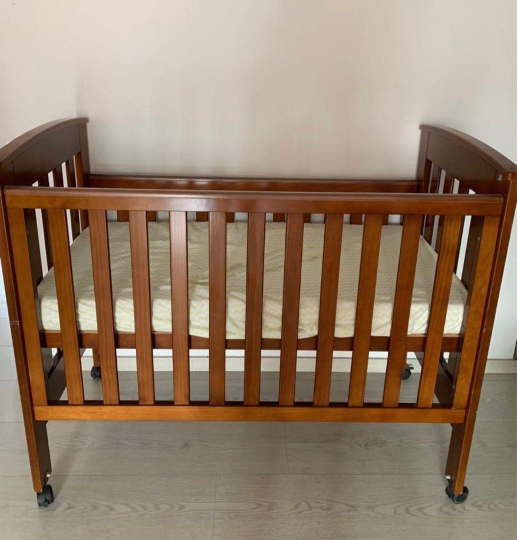 Solid wood baby cot, Babies & Kids, Baby Nursery & Kids Furniture, Cots & Cribs on Carousell