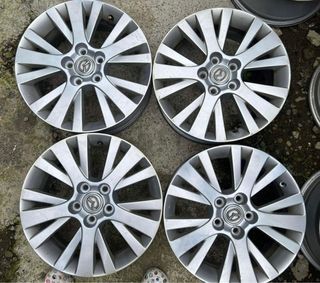 17” Mazda Stock Used mags 5Holes pcd 114 sold as 4pcs
