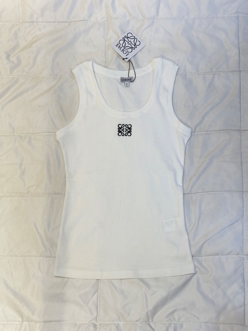 Authentic Loewe Tank Top (Preorder) (Category: Luxury Apparel) located in Manila. Submitted by designerarchives.ph (Listing ID 1256821687, Image 1). Description: Sizes: S, M, L Preloved size Small - ₱9500 Inclusions: dustbag, paperbag, notecard Colors: Black, White, Blue, Gray Actual photo is uploaded from previous transaction. Eta: 10-15 days 50% dp required Buyer will shoulder local sf Shipping: NCR - Grab/Lalamove Provincial - LBC.