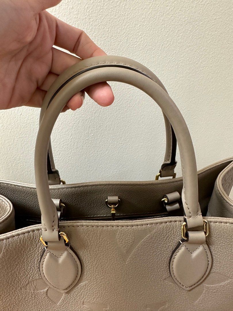 Authentic Louis Vuitton ON THE GO Tourterelle (Category: Luxury Bags & Wallets) located in Manila. Submitted by az.purse (Listing ID 1256758276, Image 2). Description: 8/10 condition Complete inclusion ( box, dustbag, receipt and entrupy certificate).
