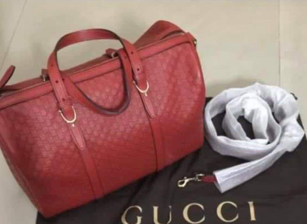 Red sales gucci duffle
