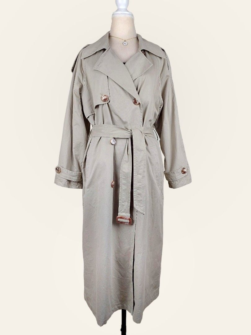 Long beige trench coat (Category: Coats, Jackets and Outerwear) located in Manila. Submitted by gabrinamnl (Listing ID 1256689952, Image 2). Description: Long beige trench coat ( TC23 ) Fabric : Cotton Twill Shoulder : 18 in Bust : 44 in Lenght : 45 in Waist : 44 in Armhole : 20 in 2XL 480 PHP.