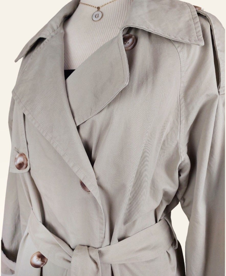 Long beige trench coat (Category: Coats, Jackets and Outerwear) located in Manila. Submitted by gabrinamnl (Listing ID 1256689952, Image 3). Description: Long beige trench coat ( TC23 ) Fabric : Cotton Twill Shoulder : 18 in Bust : 44 in Lenght : 45 in Waist : 44 in Armhole : 20 in 2XL 480 PHP.