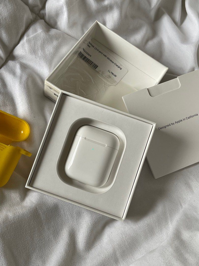 Original Airpods Gen 2 (Wireless Charging Case) (Category: Earphones) located in Pasig City. Submitted by ysa.declutters (Listing ID 1256822715, Image 2). Description: Airpods Gen 2 Wireless Charging Case - Slightly Nego - Authentic, Bought from Power Mac for ₱11,790 last 2019 - Smoothness: 90% Inclusions: L & R Airpods Wireless Charging Case Original Box Yellow Case & Dust Protector 2 Replacement Batteries priced at ₱300 Flaw: R Airpod gets lowb