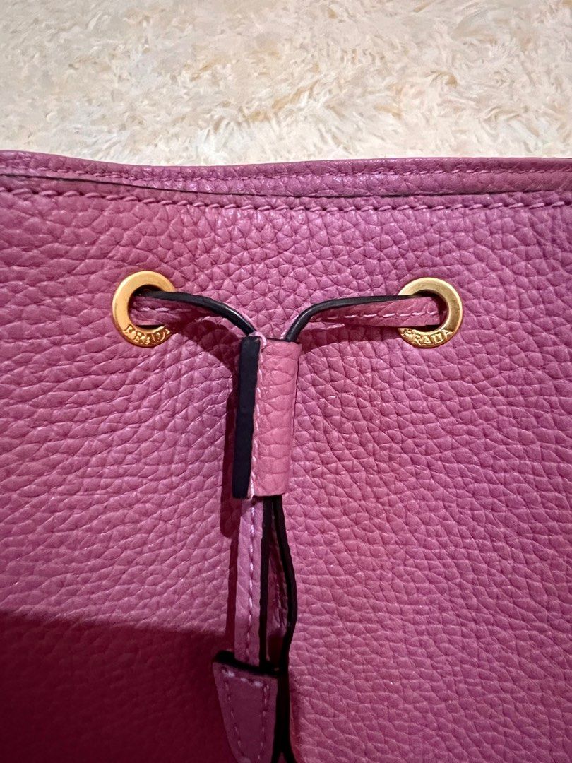 Prada Milano Bucket Bag (Category: Luxury Bags & Wallets) located in Rosario. Submitted by yazah.shop (Listing ID 1256733303, Image 3). Description: Japan-sourced Condition: 10/10, no flaws Inclusions: authenticity card, dust bag, care card, extra strap .